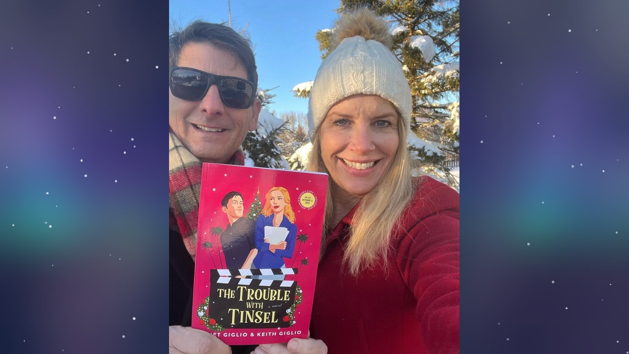 Juliet and Keith Giglio with their novel The Trouble with Tinsel