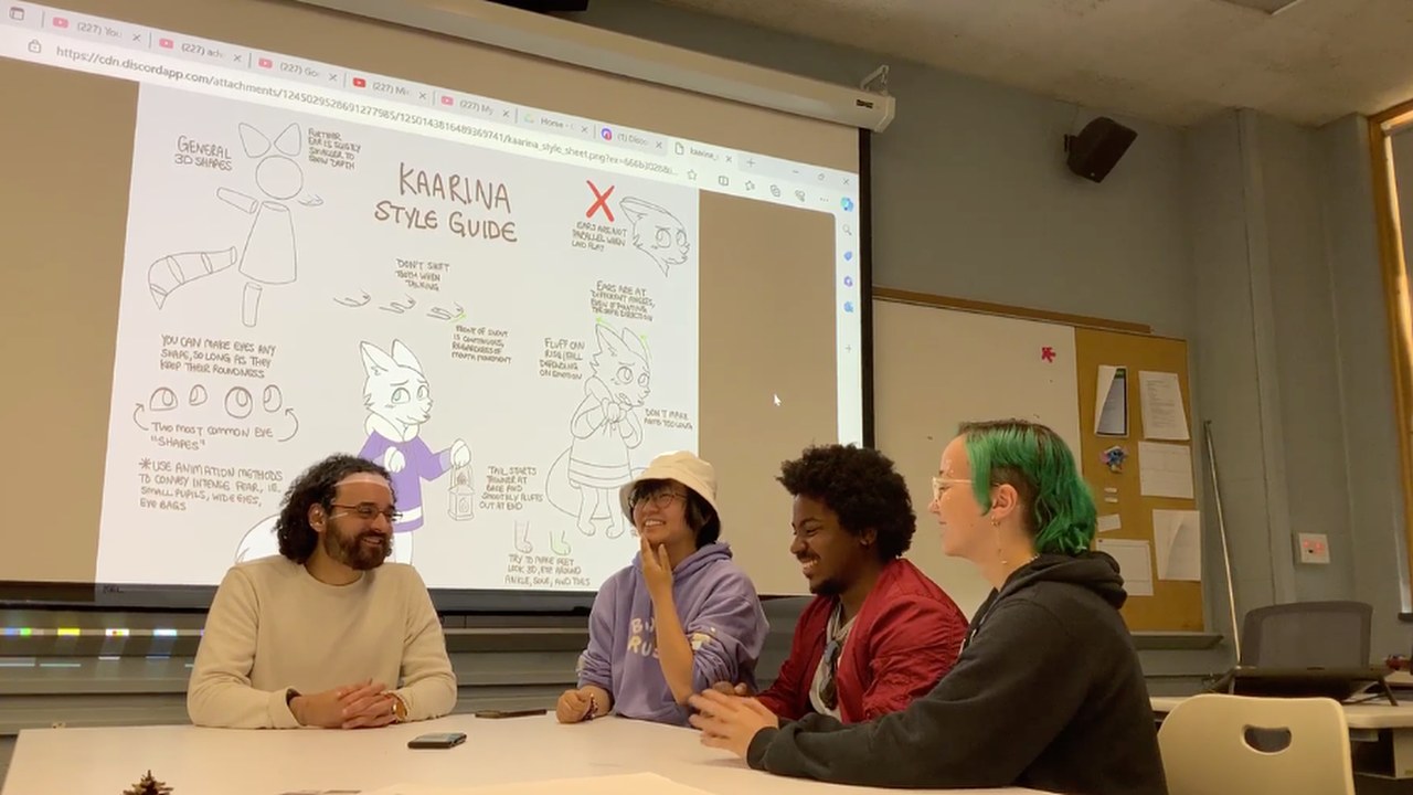 Jordan with animation students Emily, Manny, and Kel