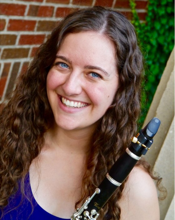 Emily Campbell smiling with her clarinet